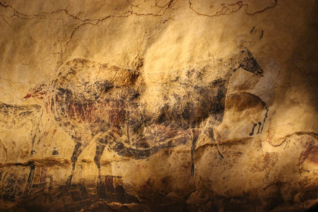 When did cave paintings first appear?