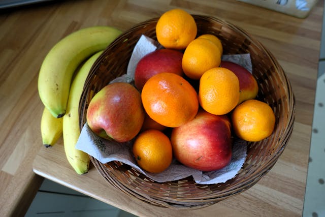 Why do apples ripen other fruits?